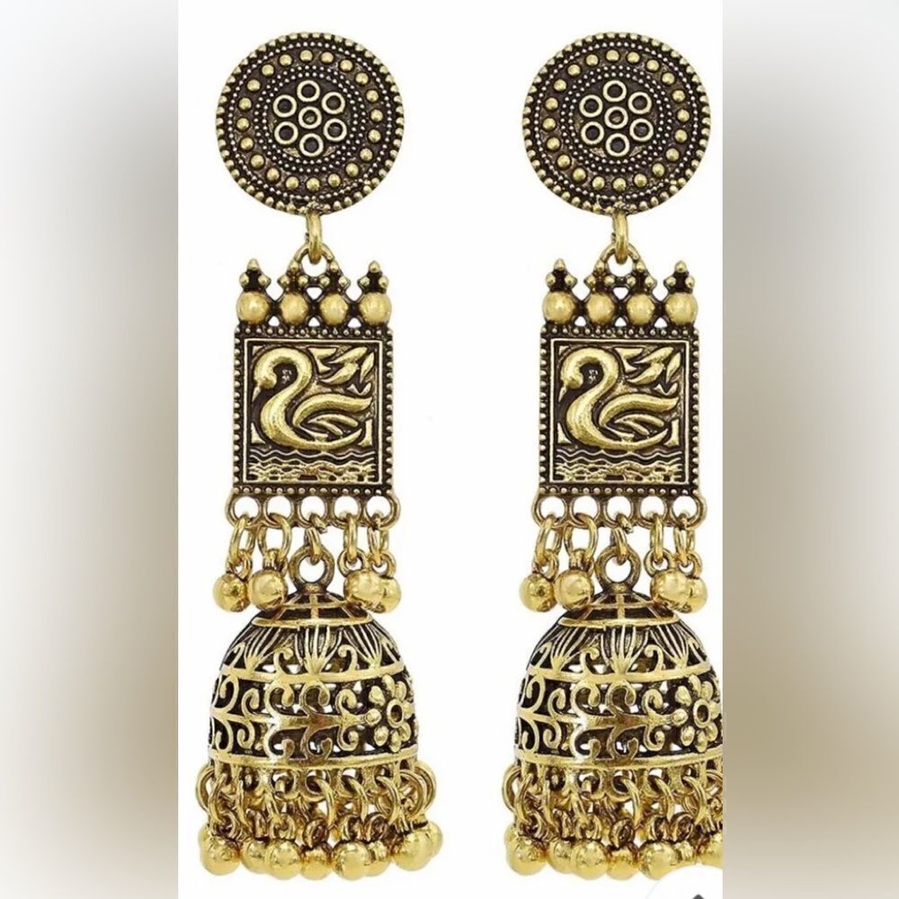 Beautiful bell tassel earrings so much detail . Really unique.